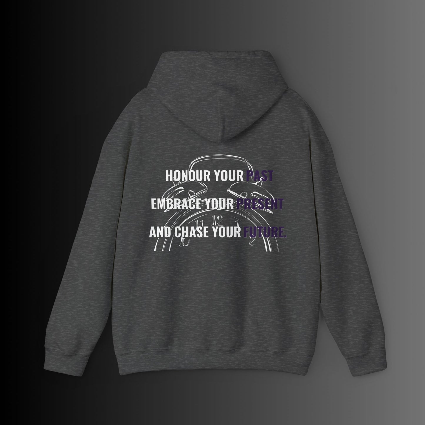 Bold Alpha Rising presents a sleek deep grey hoodie featuring the inspiring quote: 'Honour your past, Embrace your present, and Chase your future.' The quote is creatively printed within a vintage two-bell alarm clock silhouette in crisp white, symbolizing the importance of time, reflection, and forward momentum. The contrast between the bold grey fabric and the white design enhances visibility, making this hoodie a statement piece that embodies ambition, growth, and perseverance.