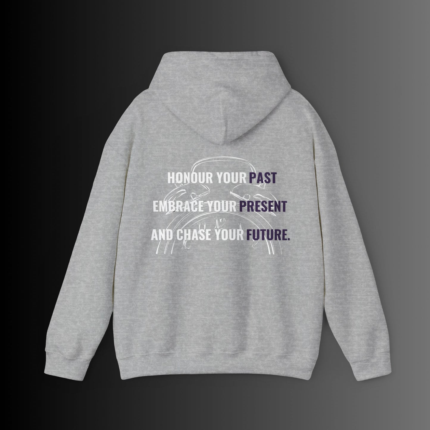 Bold Alpha Rising presents a sleek light grey hoodie featuring the inspiring quote: 'Honour your past, Embrace your present, and Chase your future.' The quote is creatively printed within a vintage two-bell alarm clock silhouette in crisp white, symbolizing the importance of time, reflection, and forward momentum. The contrast between the light grey fabric and the white design enhances visibility, making this hoodie a statement piece that embodies ambition, growth, and perseverance